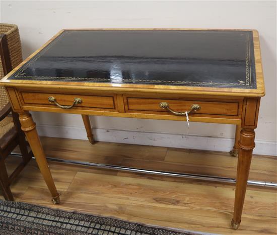 An early 20th century French satinwood writing table W.99cm